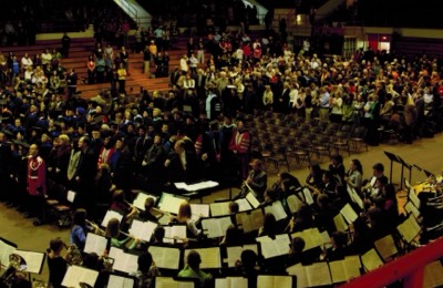  Dr. Moss conducts at the BGSU Centenniel ceremony in Anderson Arena 