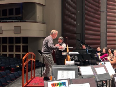  Full Circle - Moss rehearses the Univeristy of Iowa Symphony Band at the 88th ABA Convention (2023). Mvmt. 3 - Concerto for Clarinet and Wind Ensemble (Ticheli). Jorge Montilla, soloist 