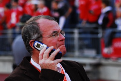  Calling in a play? Dr. Moss on his flip phone (fall, 2004) (photo: Bill Hayward) 