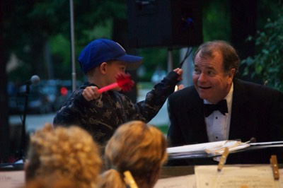  It's never too early to conduct the band! (This kid will probably direct The President's Own in about 40 years.)  