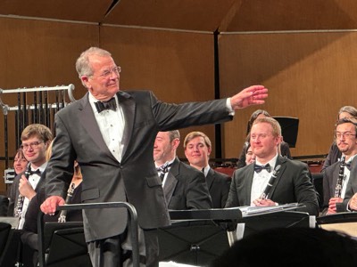  Dr. Moss on stage with the Wheaton Municipal Band at The Midwest Clinic (Dec. 2023) (photo: Bill Hayward) 