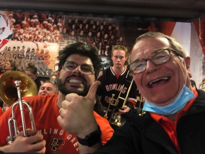  With Davis Giesler. An intense looking Jon Outrich in background. Alumni Band at BGSU Hockey (Feb. 2023) 